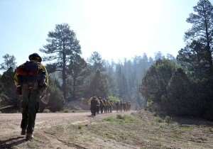 The Navajo Hotshots make their way to the fire in the Chuska Mountains near Asaayi Lake, which is east of Navajo Pine, N.M. - Times photo - Ravonelle Yazzie